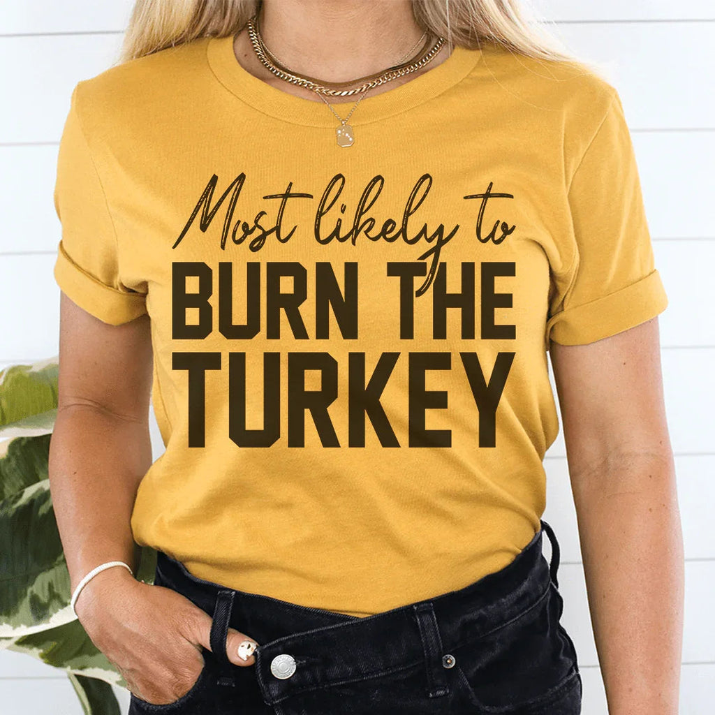 Most Likely To Burn The Turkey Thanksgiving Tee product image 4